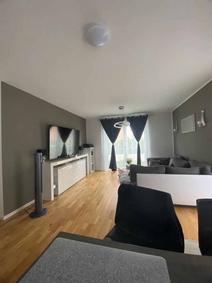 Wohnbereich mit Balkon - 2-Zimmer-Neubauwohnung mit Balkon in Lohbrügge