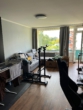 Wohnzimmer mit Balkonblick